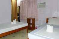 Kamar Tidur Amos Digue Pension House