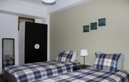 Kamar Tidur 3 TripGeo Guesthouse