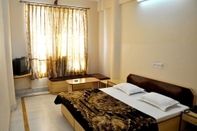 Bedroom Hotel Kirti Plaza