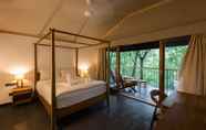 Bedroom 4 Welcomheritage Ayatana  A Super Luxury Resort in Coorg