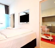 Bilik Tidur 7 Vienna Residence Lovely Apartment With Space for 2 Close to the Subway