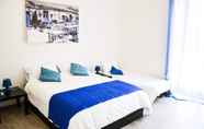 Kamar Tidur 4 Ficurinia Guest House