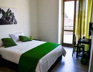 Kamar Tidur 2 Ficurinia Guest House