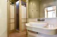 Phòng tắm bên trong Navona Charming Apartment