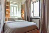 Kamar Tidur Navona Charming Apartment