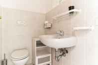 Toilet Kamar Pantheon Cozy Apartment n. 3