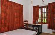 Phòng ngủ 3 Kuttickattil Gardens Home Stay