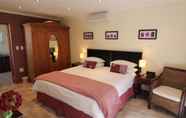 Kamar Tidur 4 Acara Guest Cottages