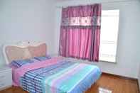 ห้องนอน Lanzhou Longshang Mingzhu Apartment Two-bedroom suite