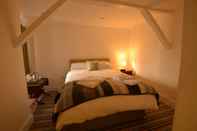 Kamar Tidur Bridge House B&B