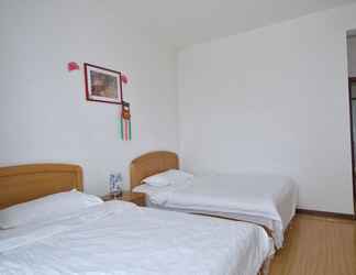 ห้องนอน 2 Lanzhou Longshang Mingzhu Apartment Three-bedroom suite