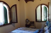 Kamar Tidur Villa delle Sirene