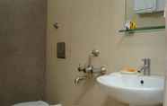 In-room Bathroom 5 Abhinav Hotel