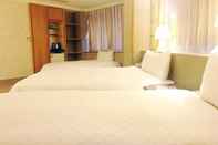 Bedroom Daxin Hotel