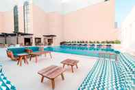 Swimming Pool Al Najada Doha Hotel by Tivoli