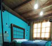Bedroom 3 Bungalow-Cabañas en Albergue Valle Do Seo