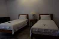 Phòng ngủ Tegal Sari Villa