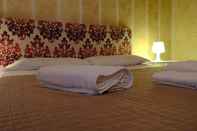 Kamar Tidur Ar Colle Guest House