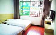 ห้องนอน 5 DONG JIANG HU XIANG CUN DA WAN CAI Hotel