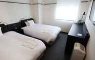 Bedroom 4 HOTEL SUI KANDA byABEST