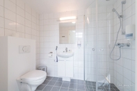 ห้องน้ำภายในห้อง Gammelskola Apartments