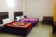 Bedroom Hotel Jai Deva Residency