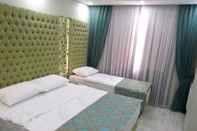 Kamar Tidur Green Garden Hotel