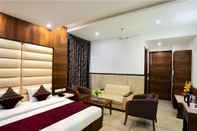 Kamar Tidur Hotel Grand Inn