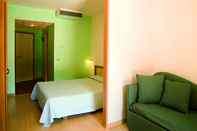 ห้องนอน Magara Hotel