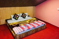 Bedroom Devdhar Hilltop Cottages