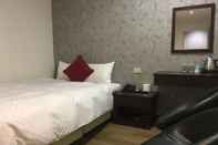 Bedroom HUA CHUN LIN Hotel