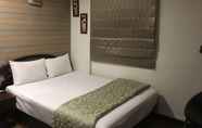 Bedroom 6 HUA CHUN LIN Hotel