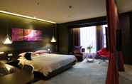 Kamar Tidur 3 Leshan Wow Hotel