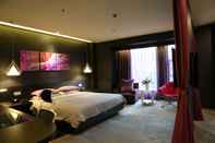 Kamar Tidur Leshan Wow Hotel