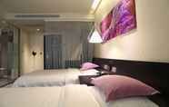 Kamar Tidur 4 Leshan Wow Hotel