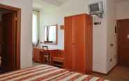 Kamar Tidur 4 Trattoria Mingaren Albergo