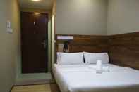 Kamar Tidur Qing Yun Resthouse Gadong Branch