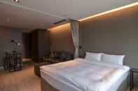 Bedroom CM Plus Hotels and Serviced Apartments