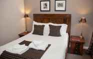 Kamar Tidur 5 The Townhouse Hotel