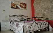 Bedroom 5 B&B Casale Shanti