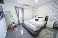 Kamar Tidur YalaRent Designed 1BR Apartments - Families only