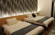 Kamar Tidur 5 New World Motel