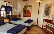 Kamar Tidur 2 Mut Mee Garden Guest House