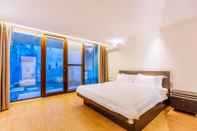 Kamar Tidur Tide Inn Sanya