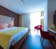 Bedroom 2 Campanile WuXi HuiShan Tower JinLong Plaza Hotel