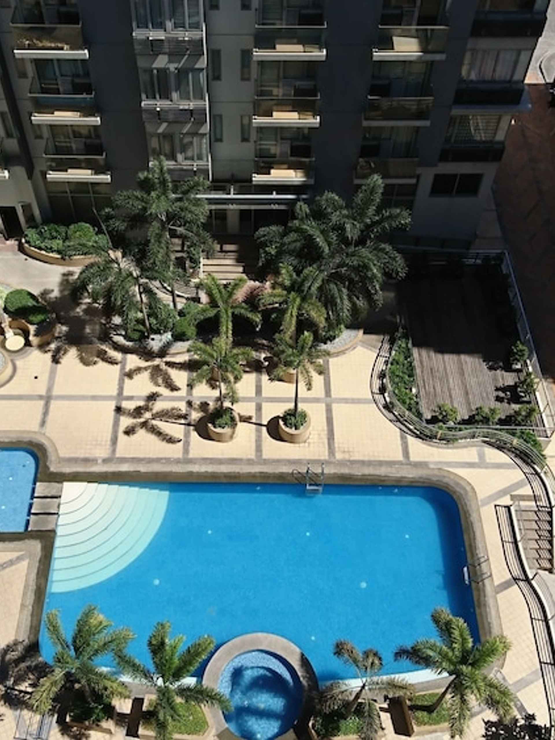 Swimming Pool One Palmtree - 2BR Across Airport