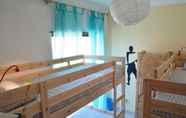 Kamar Tidur 7 Pi Guest House - Hostel