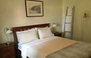 Kamar Tidur 6 The Merton Hotel