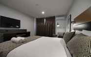 Bedroom 5 CBD Motor Inn