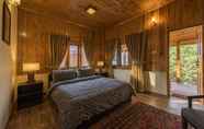ห้องนอน 6 Glade Luxury Resort